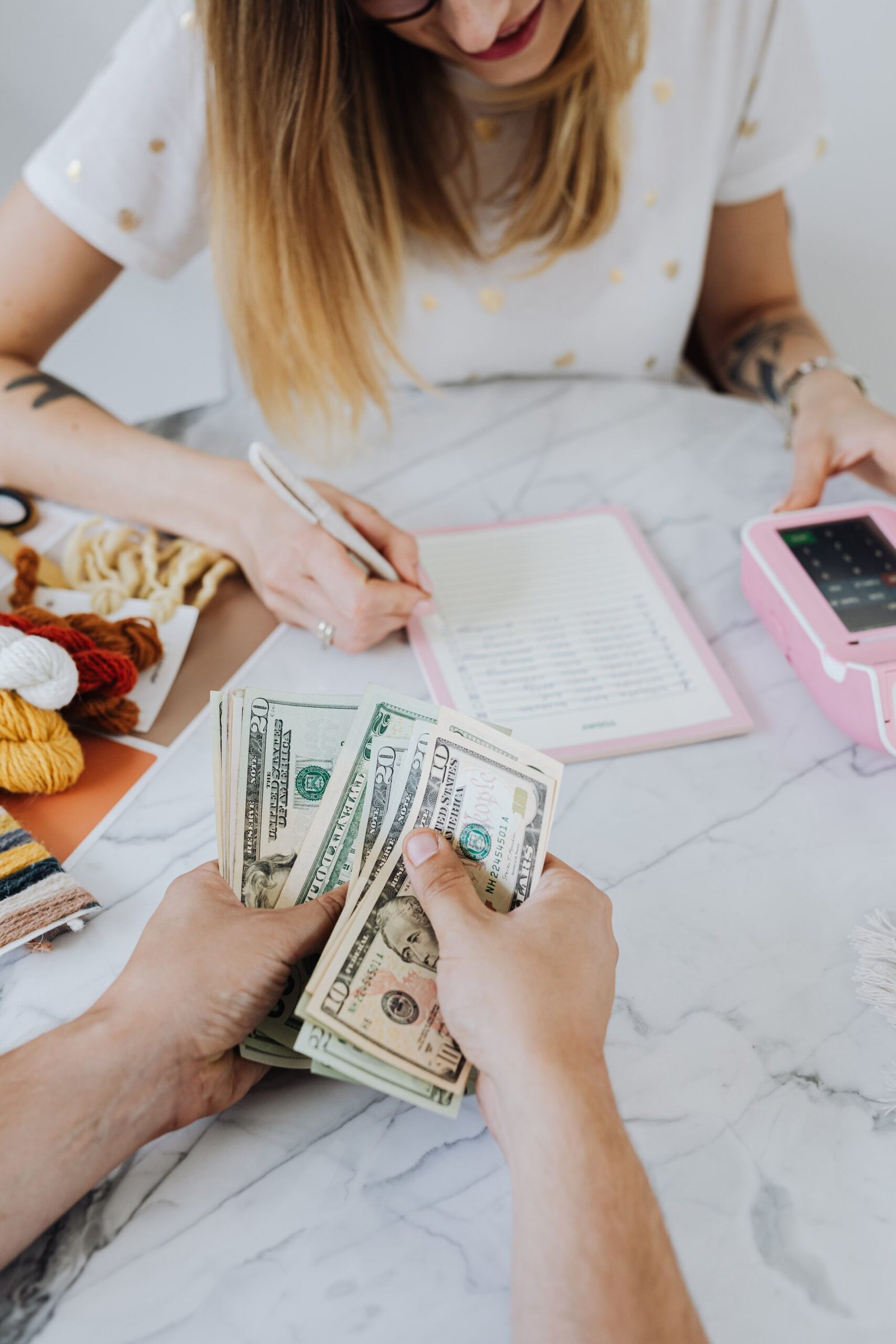 Woman creating a monthly savings strategy