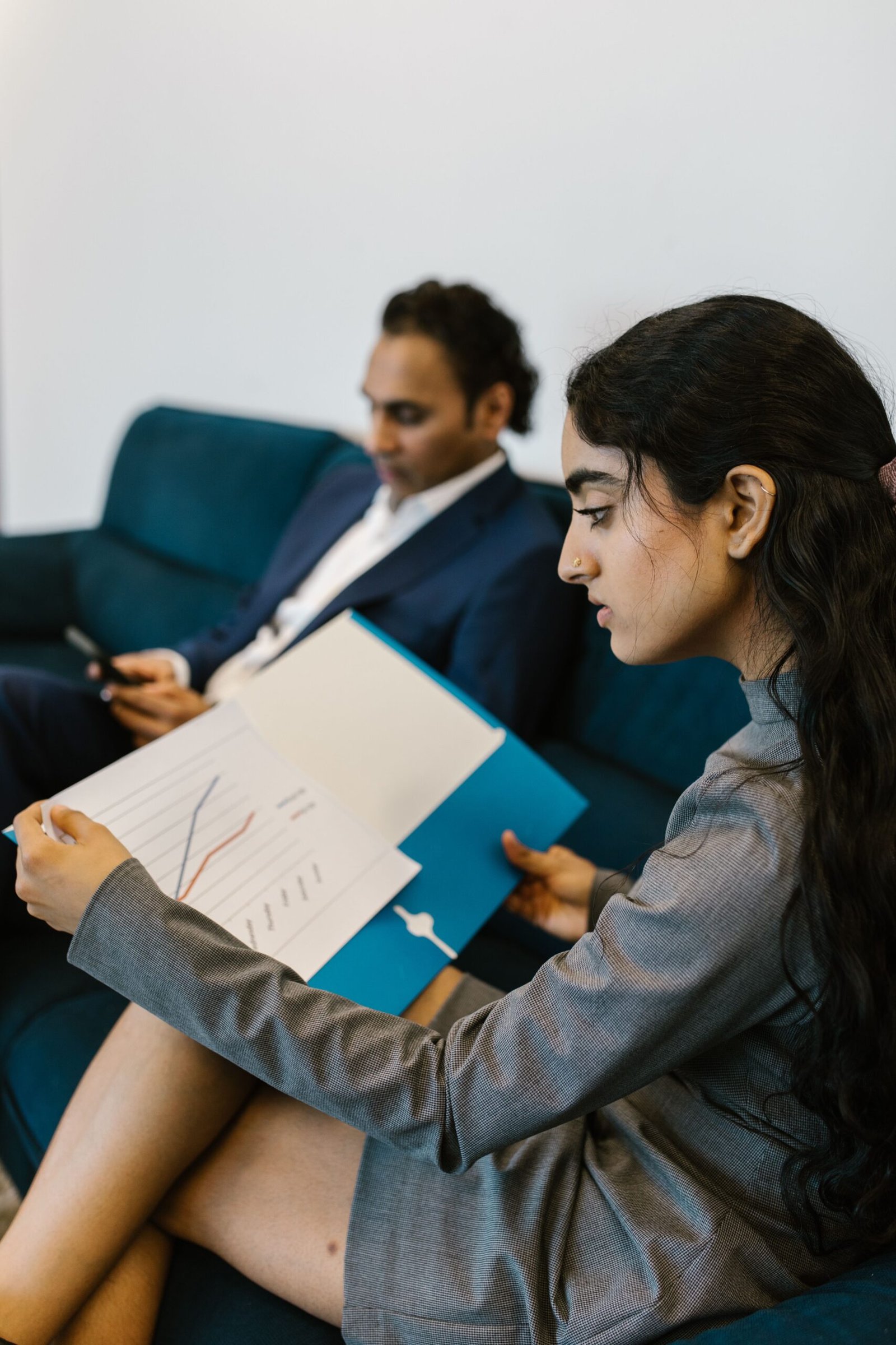 Woman planning personal finances and reviewing financial goals