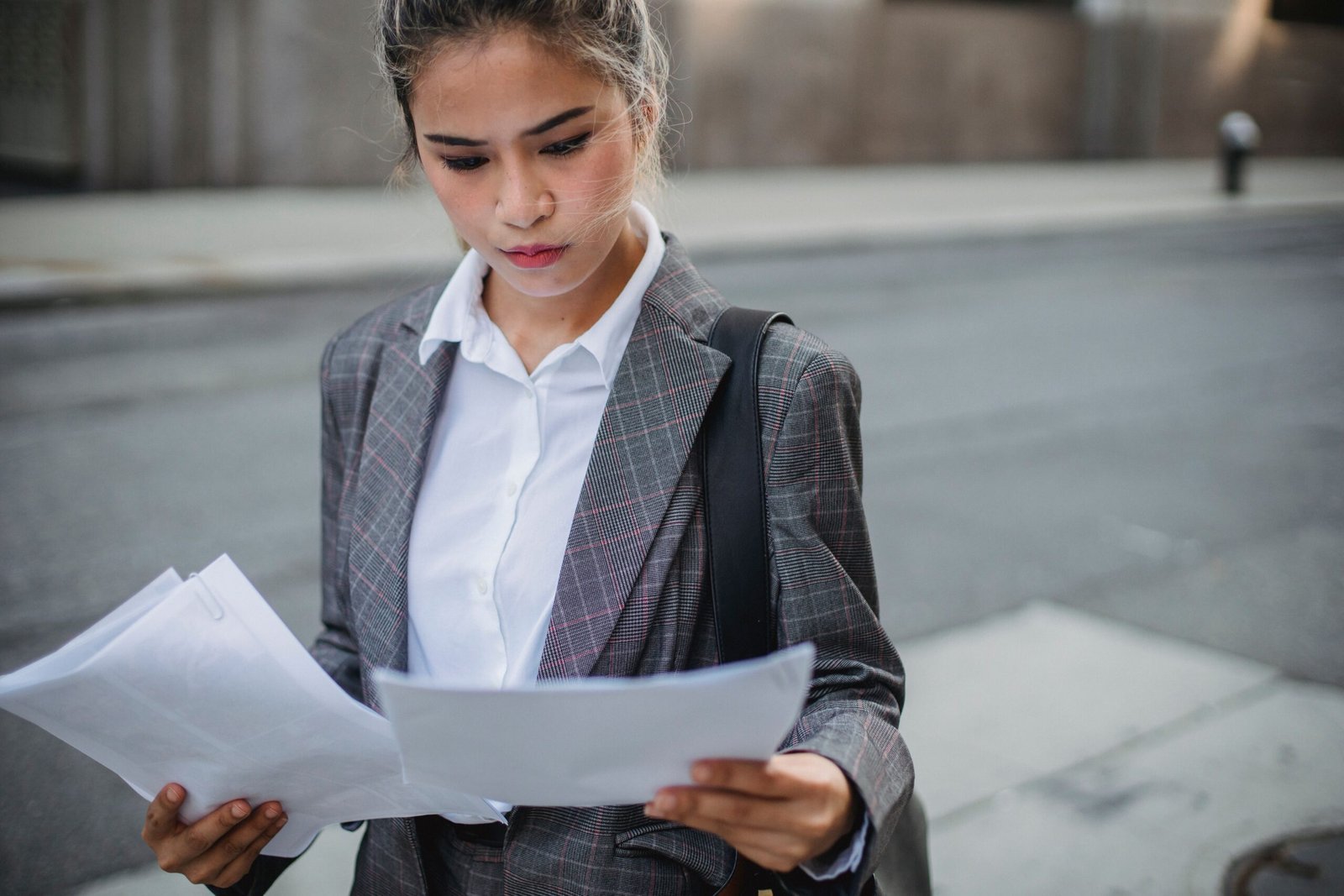 Professional woman reviewing credit and personal finance information